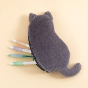 Detail view of plush cat pencil case with 3D ears and tail showing storage capacity