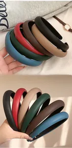 Detail view of colorful faux leather sponge headbands showing thickness and grain texture