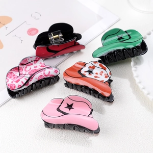 Five retro cowboy hat hair claws in diverse patterns and colors for women’s styling