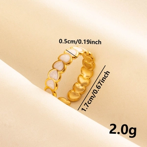 Detail of 304 stainless steel gold heart ring with white enamel and product dimensions