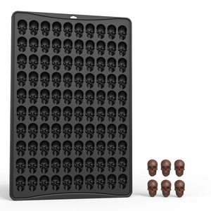 Black silicone skull chocolate mold for baking featuring 100 cavities for small treats