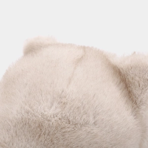 Detail shot of soft faux fur material and fluffy cat ear on this winter baseball cap