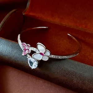 Vintage zircon butterfly open bangle with pink stones and white mother of pearl inlay