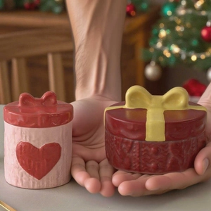 Detail of knitted pattern resin heart candle jar mold with 3D bow gift box texture