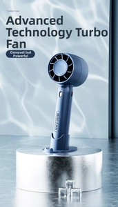 Detail of portable mini turbo fan in navy blue with a detachable stand and USB port