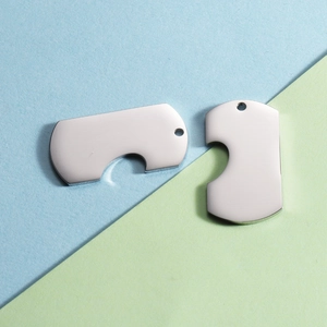 Close-up of interlocking heart puzzle keychains in polished mirror-finish stainless steel