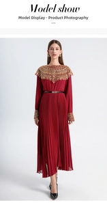 Detail of burgundy pleated maxi dress with gold bead embroidery and sequin neckline