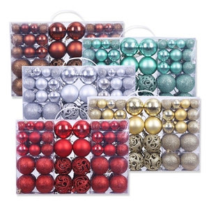 Detail view of multicolored Christmas baubles with matte, glossy, and glitter finishes