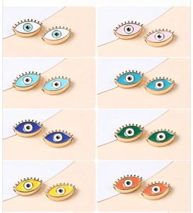 Macro view of multi-color Evil Eye alloy charms with colorful oil drip finish for DIY jewelry