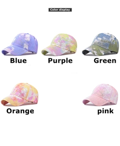 Detailed color selection showing five tie-dye baseball caps with rhinestone bear designs