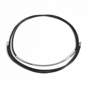 Detail of minimalist black braided waist rope with curved silver metal hardware
