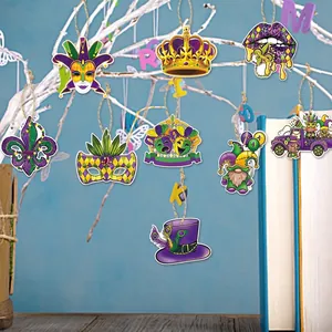 Mardi Gras carnival party decorations featuring purple green and gold festive masks and crowns