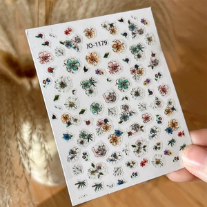 Close-up of JO-1179 vintage floral nail art stickers with roses and daisies