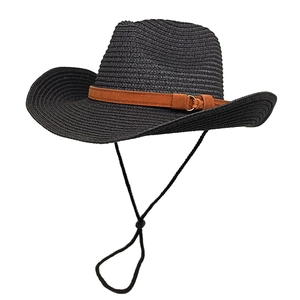 Detail of black straw cowboy hat with orange suede band and adjustable chin strap