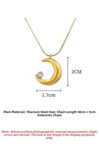Detail showing a golden crescent moon pendant necklace with zircon stone inlay and dimensions