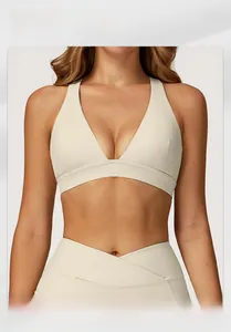 Detail of cross-back yoga bra and V-waist leggings with model size S specifications