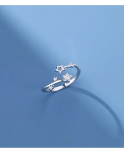 Close-up of S925 silver adjustable ring featuring hollow and zircon-set star charms