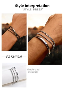 Detail of 3-piece silver stackable bracelet set with cuff, snake and Cuban chain links