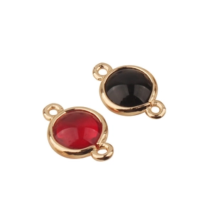Gold-plated round crystal connectors in red and black for DIY jewelry making