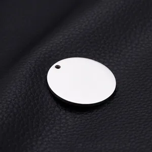 Polished silver stainless steel round blank pendant for jewelry making on black leather