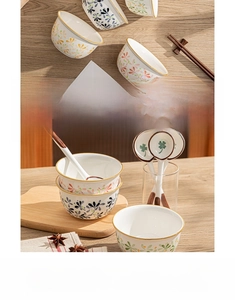 Detailed underglaze floral ceramic rice bowl with gold rim and matching soup spoon set