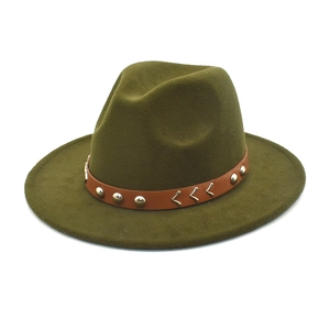 Close-up of olive green wool felt hat featuring brown leather band with gold studs