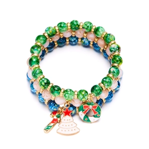 Three-piece Christmas beaded bracelet set with tree, candy cane, and wreath charms