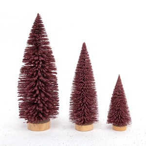 Three deep red flocked bottle brush Christmas trees in various sizes on wooden bases
