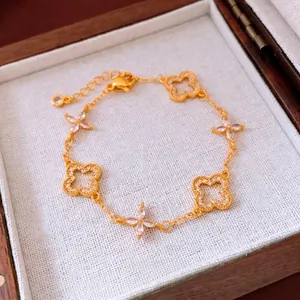 24K gold plated flower镂空 adjustable bracelet with white zircon clover pendants