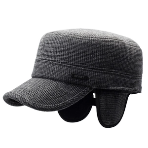 Men's winter flat top cap with fleece ear flaps and grey houndstooth pattern
