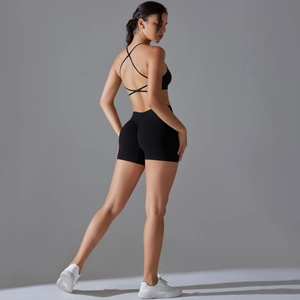 Detailed back view of black criss-cross sports bra and scrunch butt yoga shorts set