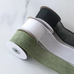 4cm faux linen Christmas ribbons in forest green, white, and black with wire edges