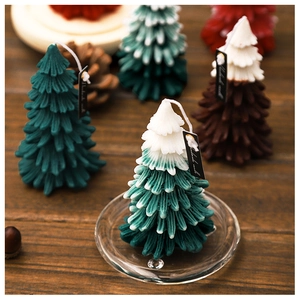 Macro view of Christmas tree scented candles with detailed needle textures and colors