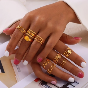 Set of ten gold hollow geometric rings with heart and chain designs for women