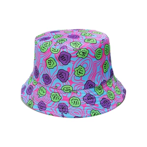 Detail of colorful psychedelic bucket hat with melting smiley face patterns and vibrant fabric