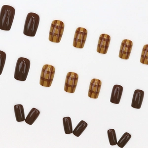 Short square press-on nails with caramel brown solid color and plaid checkered pattern