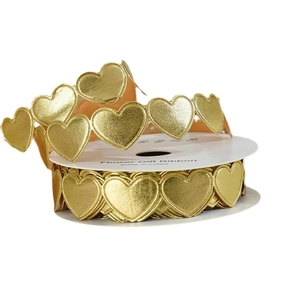 Golden heart-shaped metallic ribbon roll for floral gift wrapping and decorations