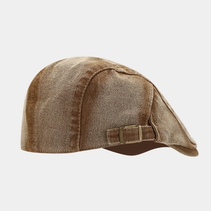 Vintage brown washed flat cap for men with adjustable brass buckle on side view