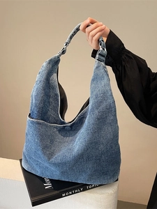 Minimalist blue denim tote bag with large capacity and shoulder strap for daily commute