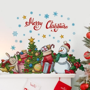 Detail of Christmas wall decals with Merry Christmas text, snowman and festive tree
