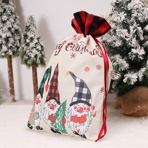 Christmas gift bag featuring three forest gnomes and Merry Christmas text in snow scene