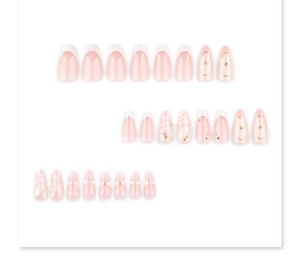 Detail of 3D Bohemian press-on nails with French tips, marble patterns, and pearl accents