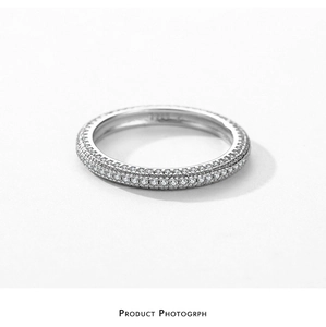 Detailed close-up showing S925 hallmark and micro-pave white zircons on silver ring