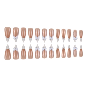 Long stiletto press-on nails with white French tips, 3D bows, and pearls, 24-piece set