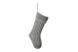 Detailed view of gray knit Christmas stocking with thick texture and hanging loop
