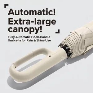 Automatic cream-colored folding umbrella with innovative hook handle for windproof protection