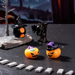 Miniature Halloween decor set with wizard hut, pumpkin lantern, and ghostly tree stump