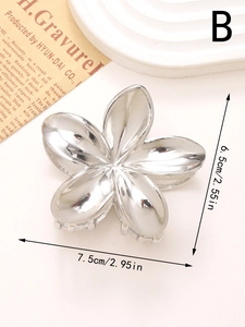 Silver frangipani flower hair claw clip with metallic finish and size measurements