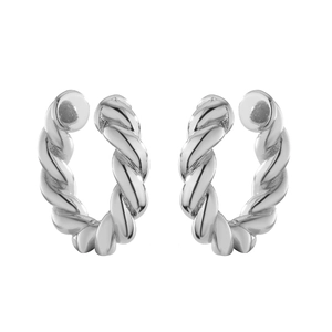 Macro shot of silver twisted rope ear cuffs with smooth ball ends in a minimalist C-shape