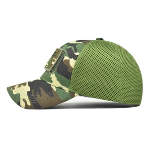 Detail of woodland camouflage tactical baseball cap with breathable mesh and velcro patch area
